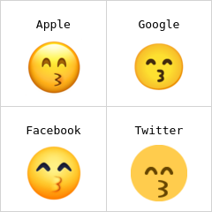 Kissing face with smiling eyes emoji