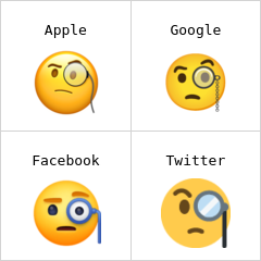 Muka dengan cermin mata satu kanta Emoji